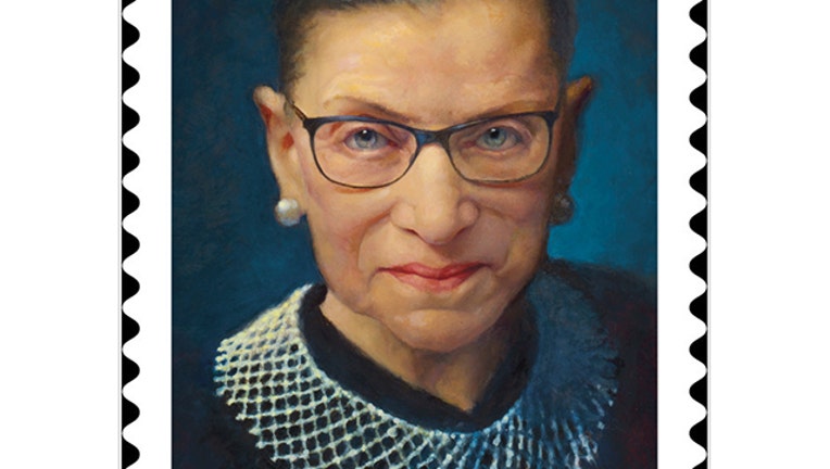 A USPS stamp design featuring a painted portrait of Justice Ruth Bader Ginsburg wearing a black robe and white collar
